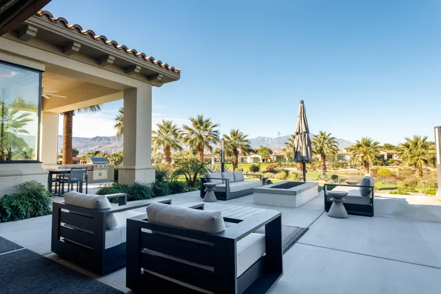 a view of a swimming pool with chairs
