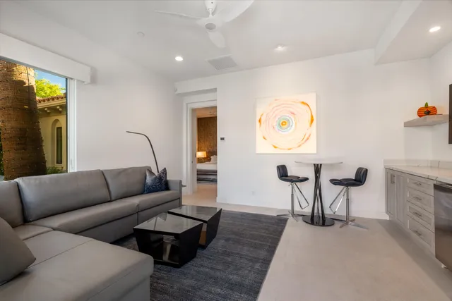 a bathroom with double vanity sink and mirror