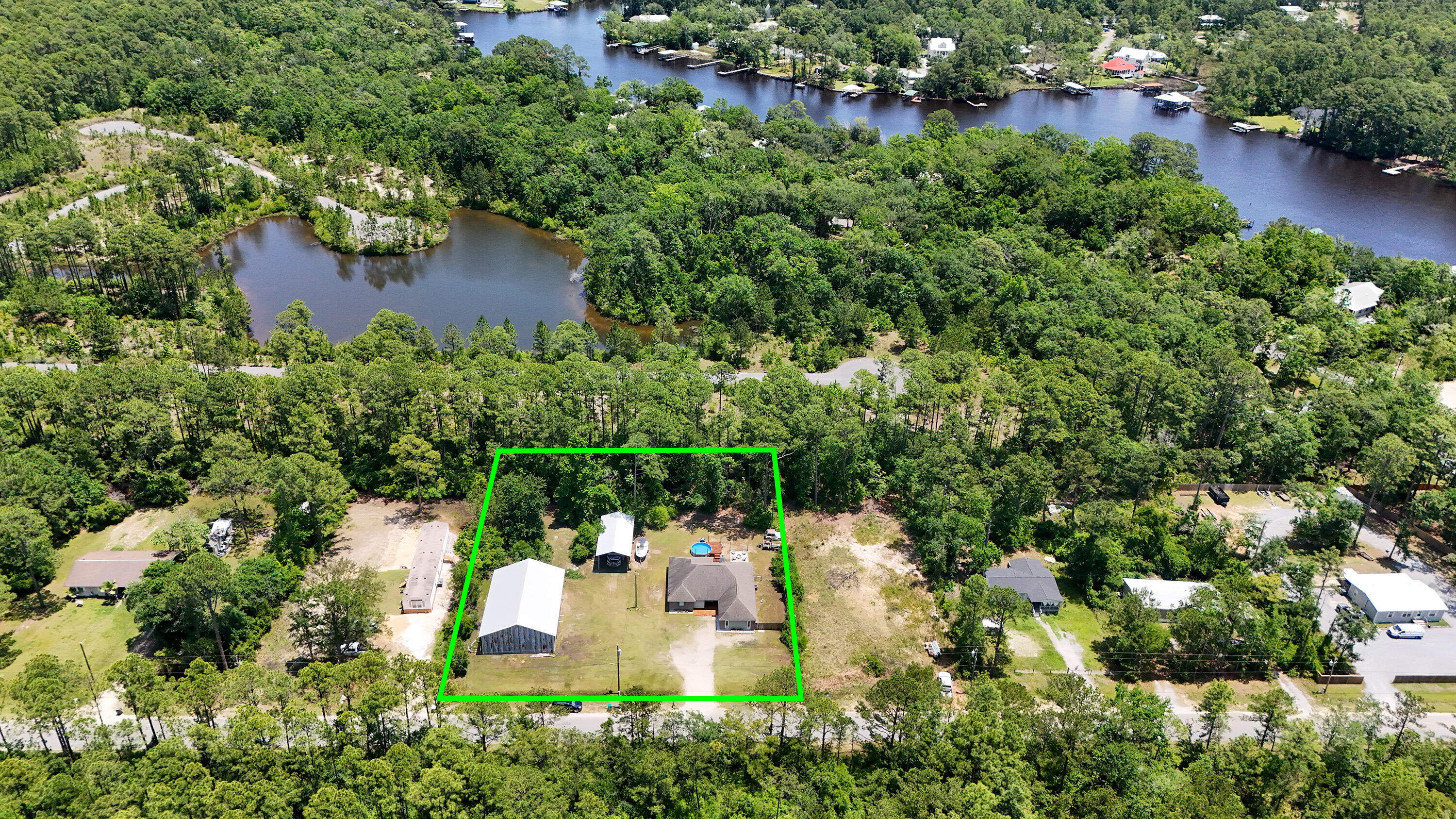241 Mullet Drive Freeport, FL 32439 - Photo 56 of 61 DJI_20240804224107_0015_D