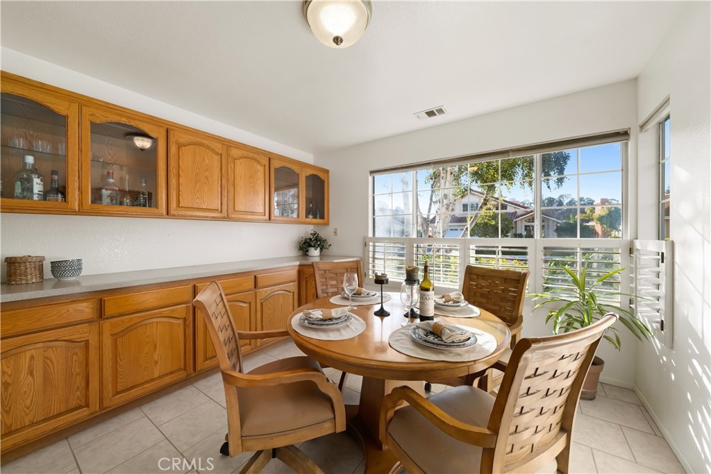 634 Riviera Circle Nipomo, CA 93444 - Photo 17 of 40 a view of a dining room with furniture window and outside view