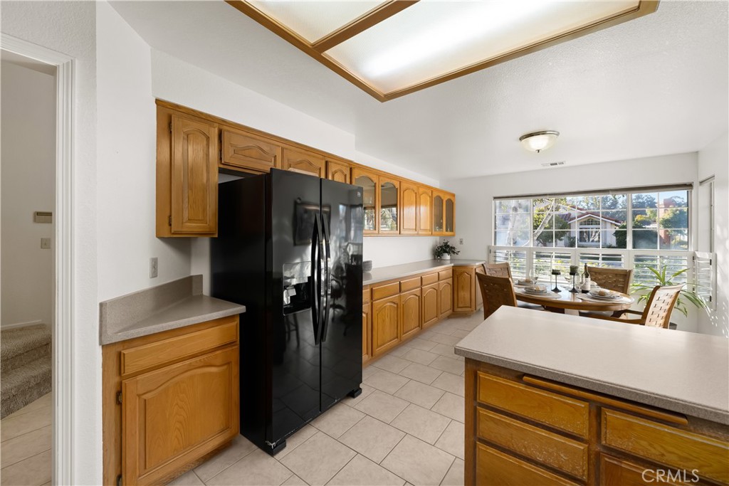 634 Riviera Circle Nipomo, CA 93444 - Photo 20 of 40 a kitchen with a refrigerator and a sink