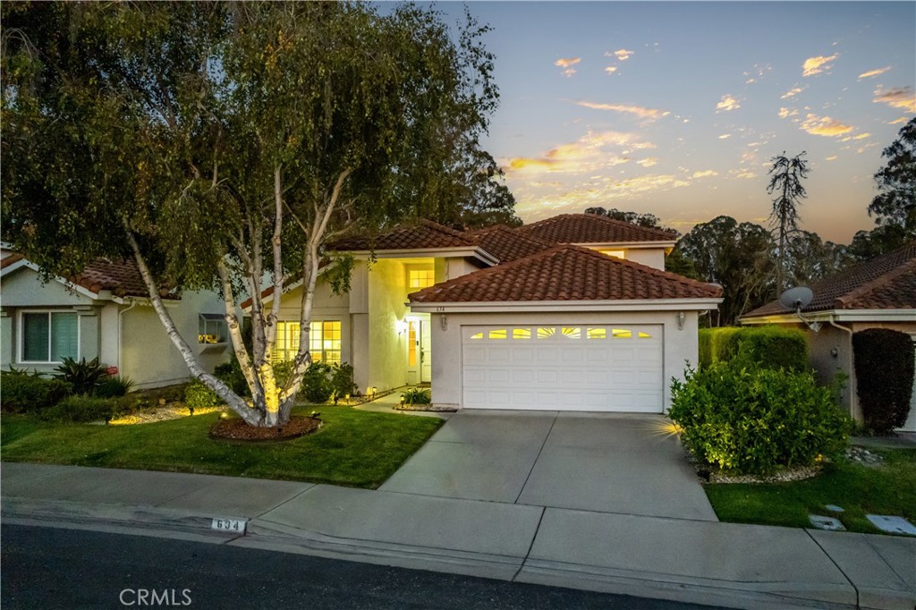 634 Riviera Circle Nipomo, CA 93444 - Photo 2 of 40 a front view of a house with garden