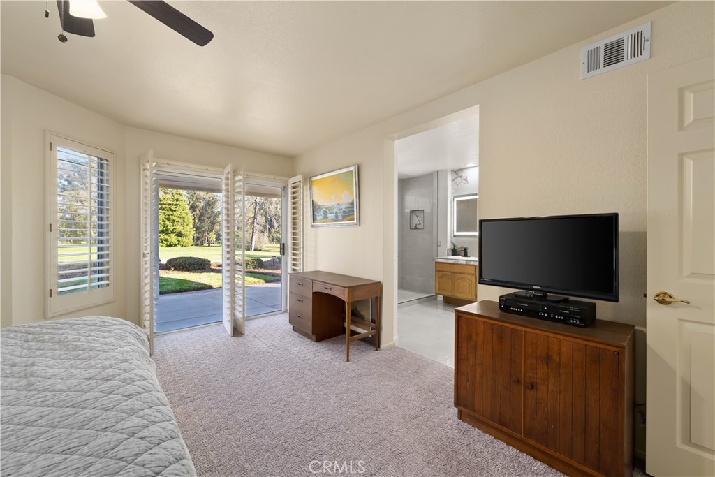 634 Riviera Circle Nipomo, CA 93444 - Photo 24 of 40 a living room with furniture and a flat screen tv
