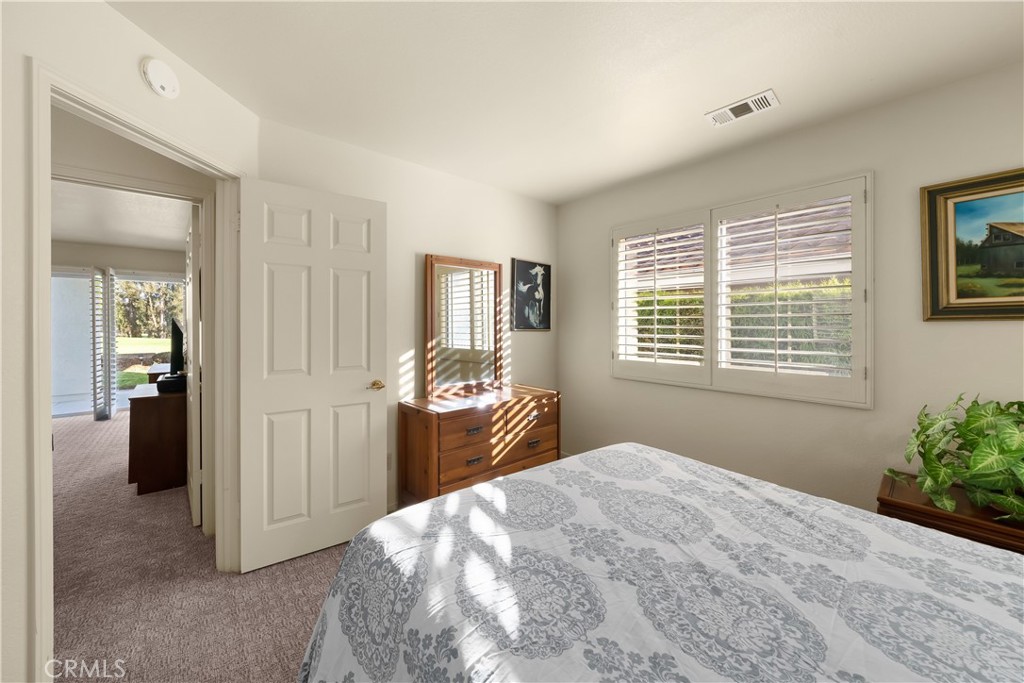 634 Riviera Circle Nipomo, CA 93444 - Photo 29 of 40 a bedroom with a bed and a window