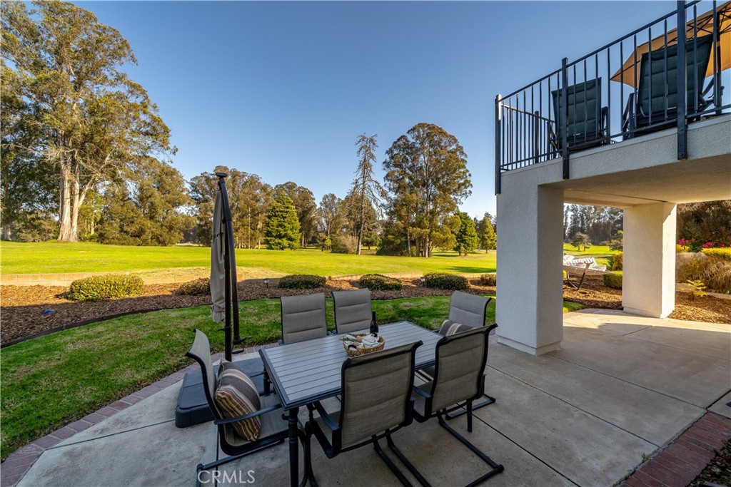 634 Riviera Circle Nipomo, CA 93444 - Photo 7 of 40 a view of swimming pool with outdoor seating and a garden