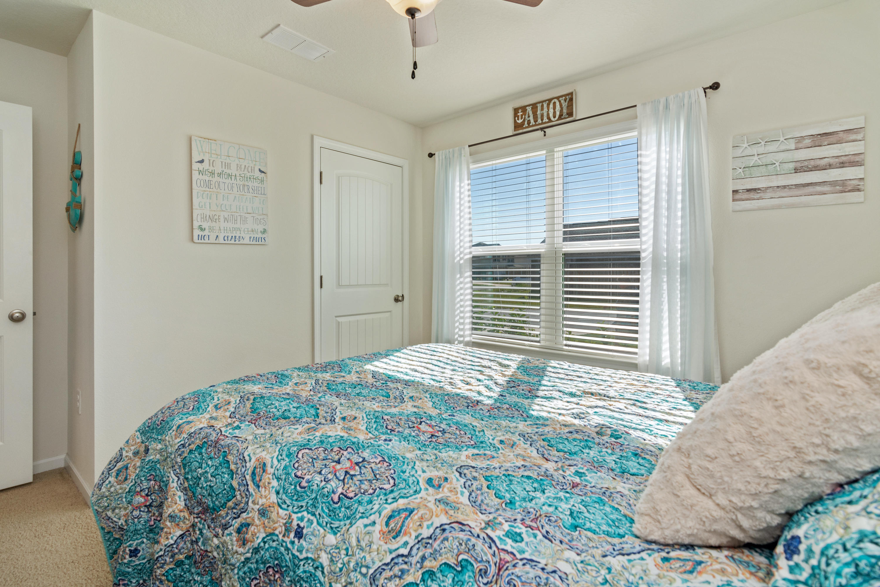 501 Merganser Way Crestview, FL 32539 - Photo 11 of 34 a bedroom with a bed and a window