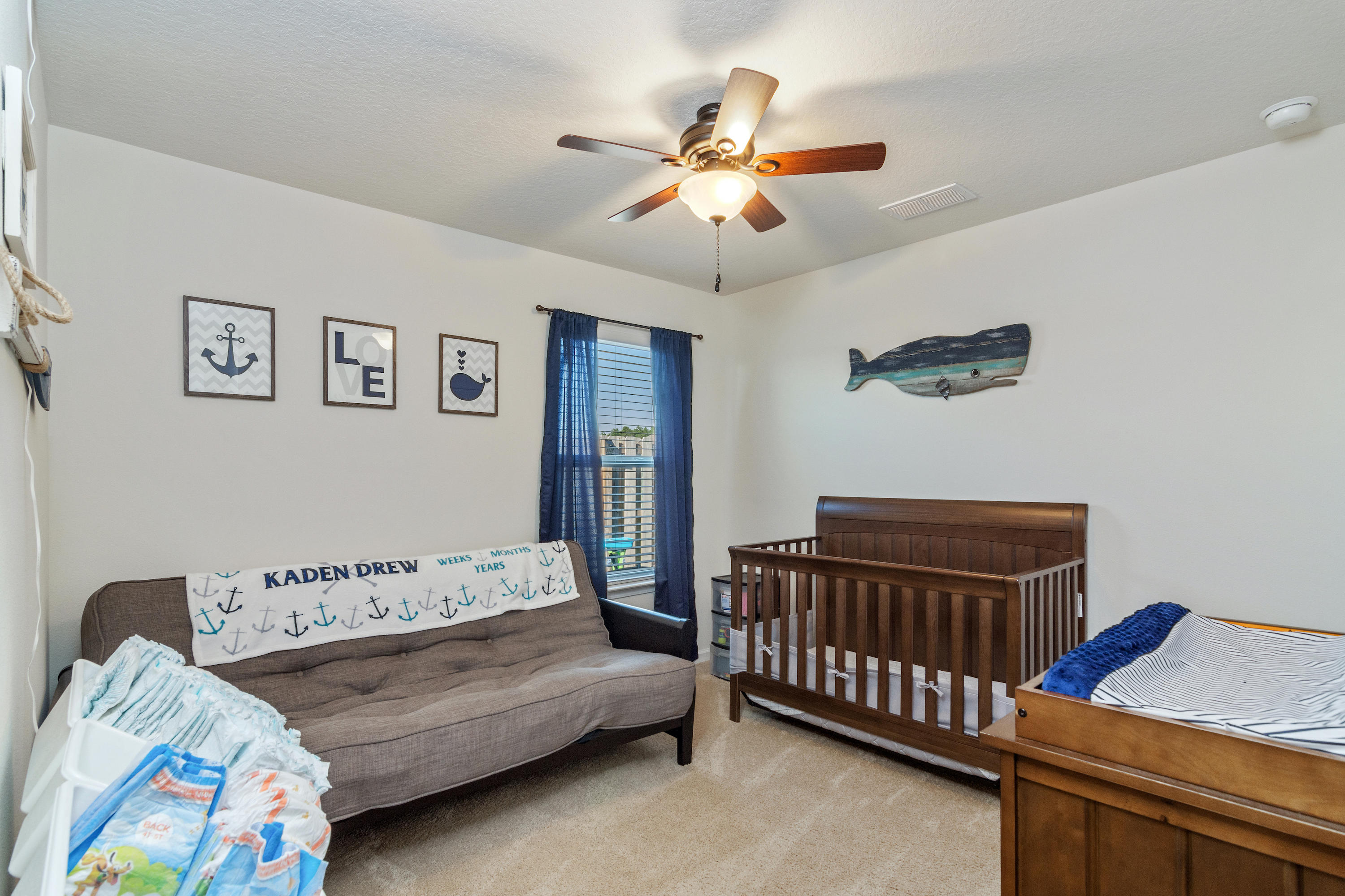 501 Merganser Way Crestview, FL 32539 - Photo 14 of 34 a bedroom with furniture and a window