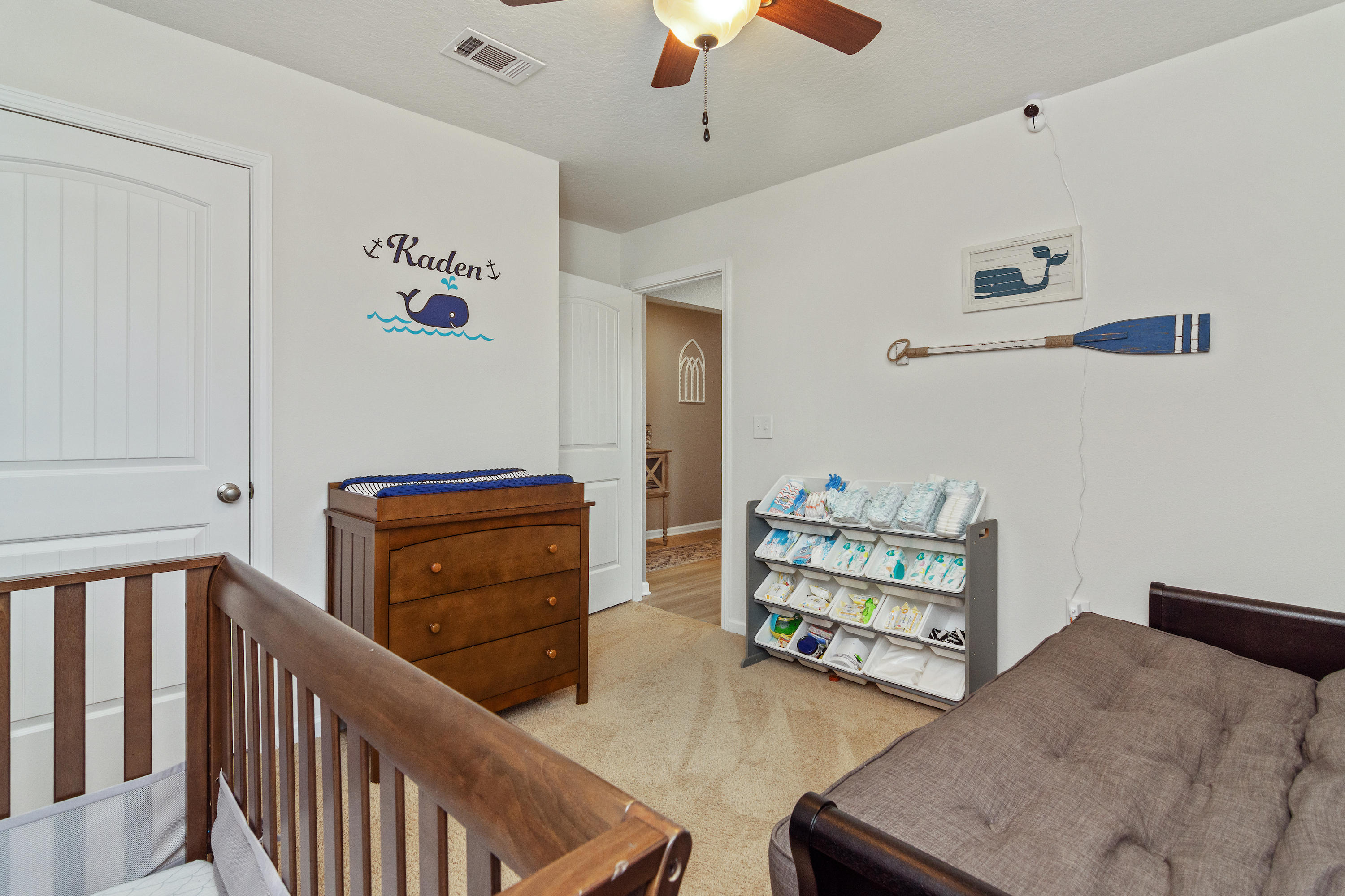 501 Merganser Way Crestview, FL 32539 - Photo 15 of 34 a bedroom with furniture and a dresser
