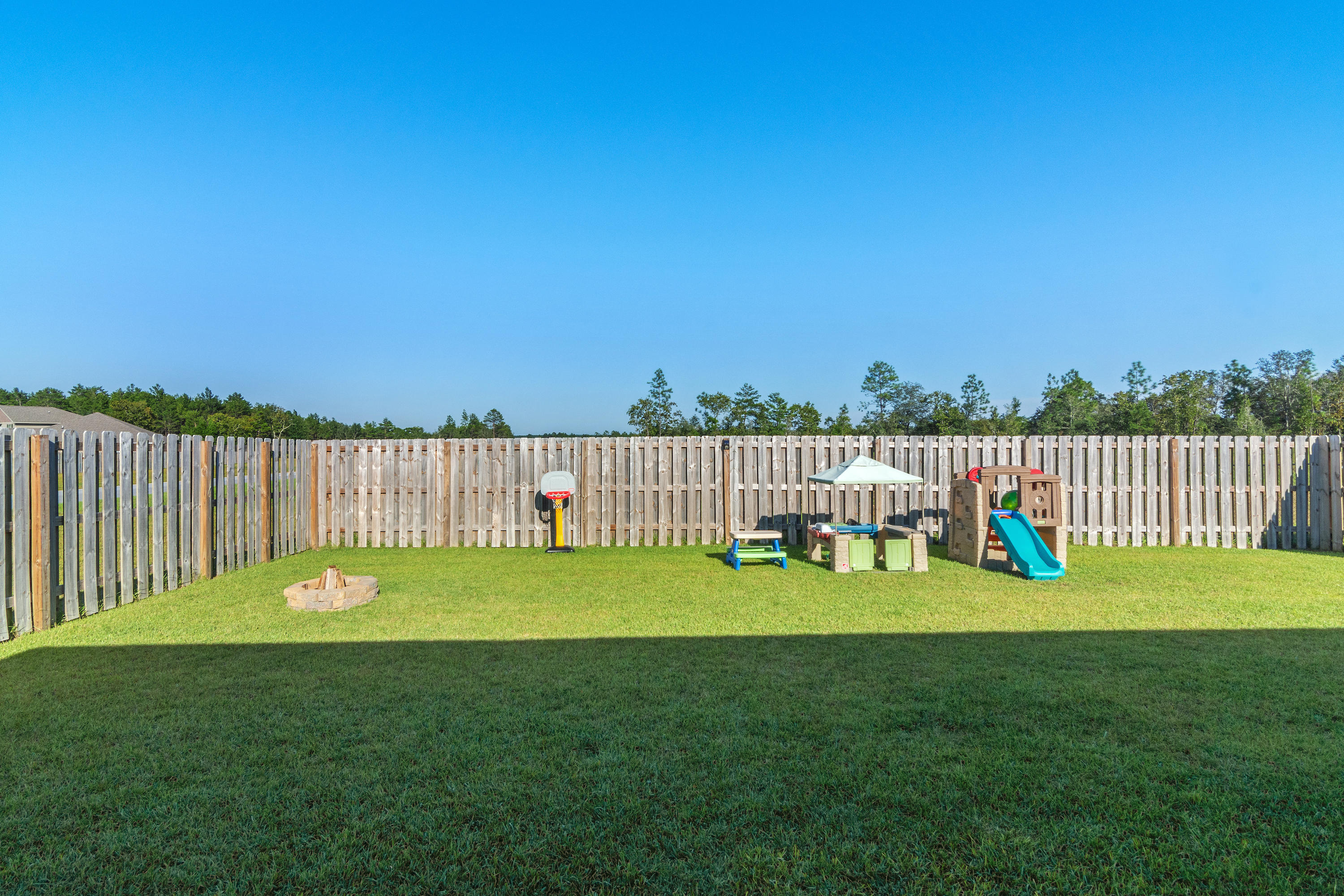 501 Merganser Way Crestview, FL 32539 - Photo 25 of 34 a view of a golf course with a lake