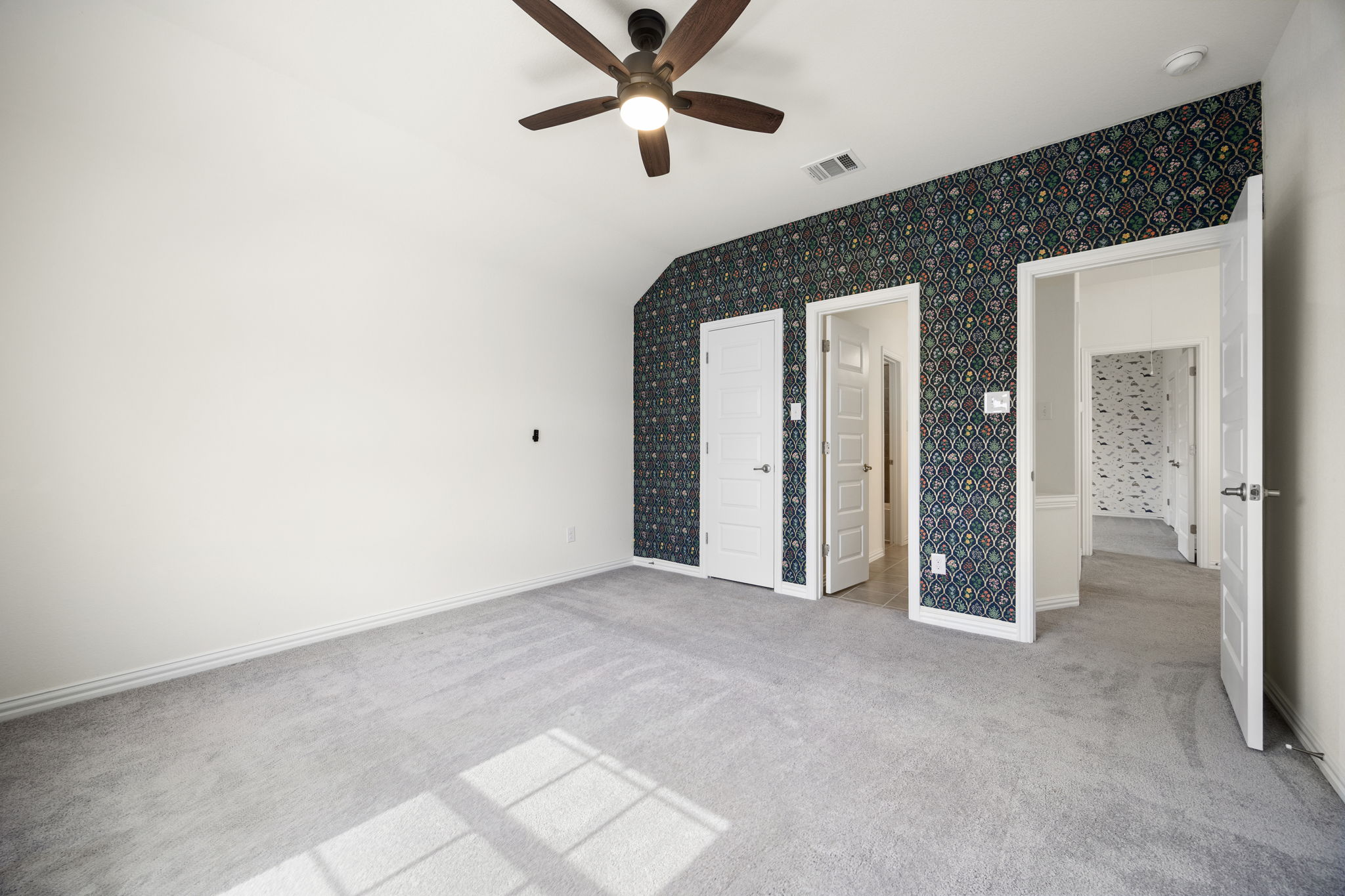 1098 Cherrystone Loop Buda, TX 78610 - Photo 24 of 37 a view of empty room with ceiling fan