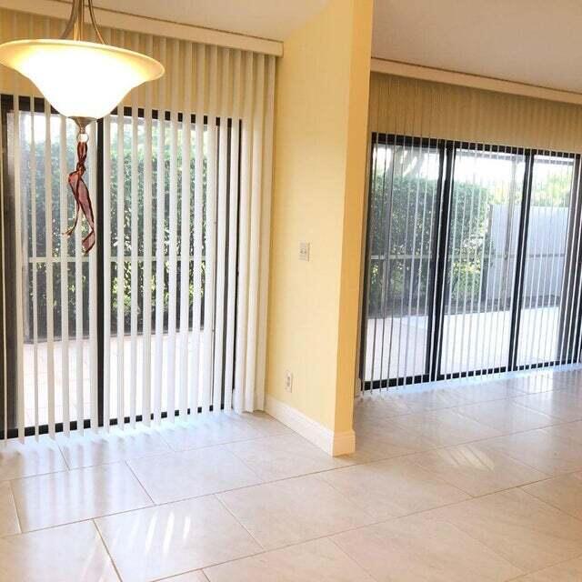 7722 Solimar Circle Boca Raton, FL 33433 - Photo 14 of 36 a view of a room with a large window