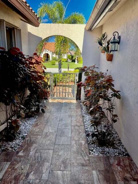 7722 Solimar Circle Boca Raton, FL 33433 - Photo 17 of 36 a view of entryway front of house