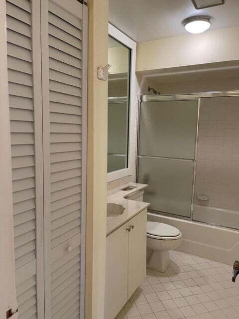 7722 Solimar Circle Boca Raton, FL 33433 - Photo 31 of 36 a bathroom with a sink a toilet and shower