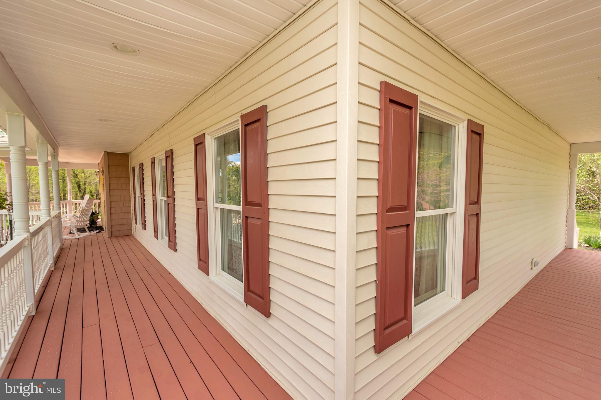 3358 White Hall Road King George, VA 22485 - Photo 11 of 56 The wrap around porch for quiet activities.