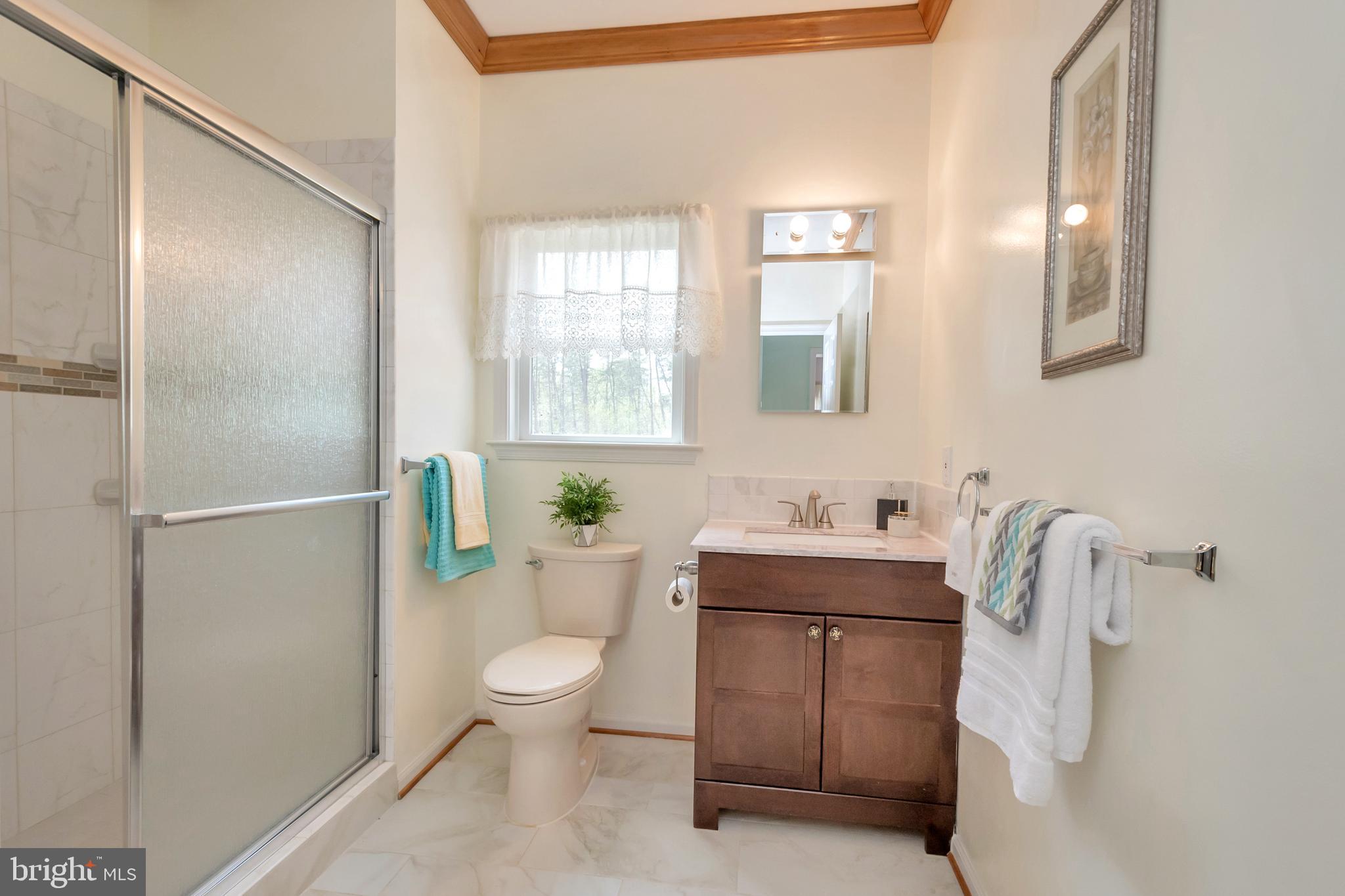 3358 White Hall Road King George, VA 22485 - Photo 32 of 56 Full bath with shower, by the garage entrance.