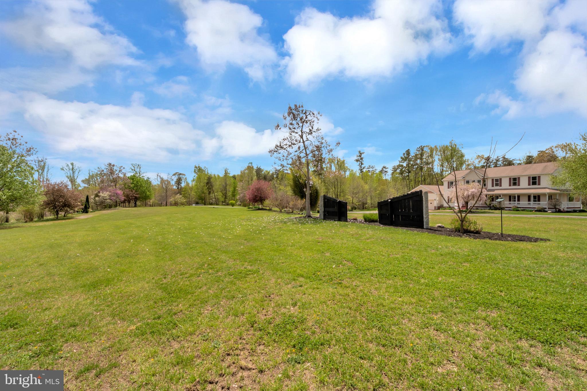 3358 White Hall Road King George, VA 22485 - Photo 6 of 56 Ten acres of manicured lawns, fields and pasture.