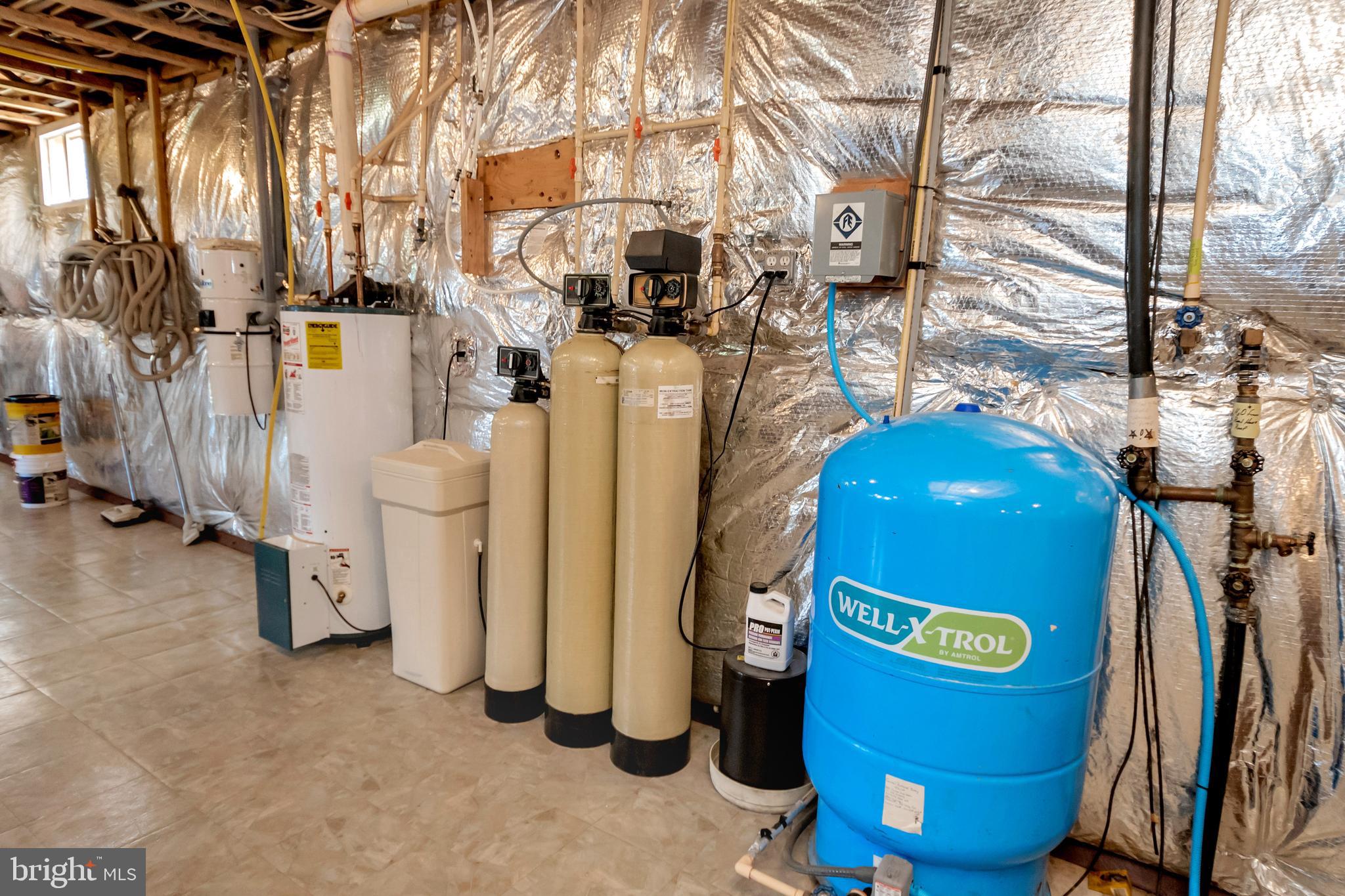 3358 White Hall Road King George, VA 22485 - Photo 52 of 56 Water treatment system and pressure tank.