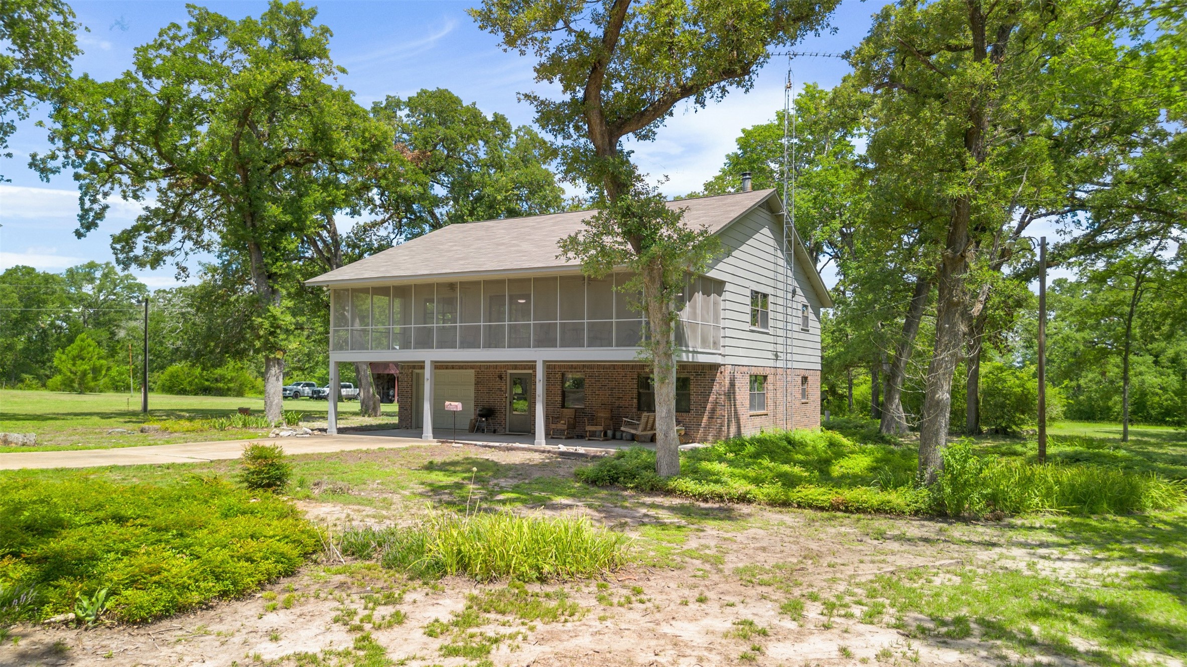729 Centerhill Cemetery Road Crockett, TX 75835 - Photo 13 of 43 a front view of a house with a yard