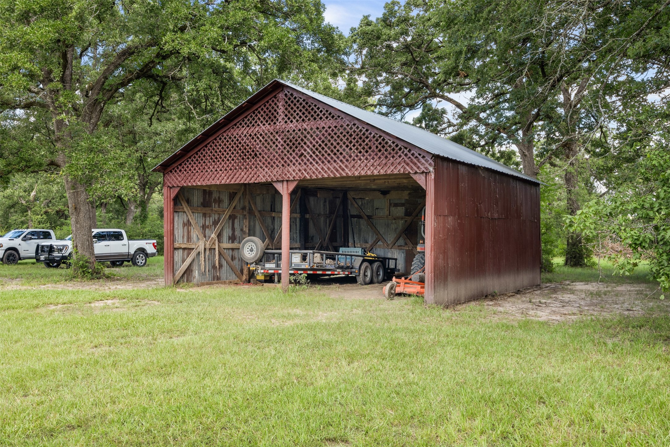 729 Centerhill Cemetery Road Crockett, TX 75835 - Photo 38 of 43 a view of a house with backyard porch and sitting area