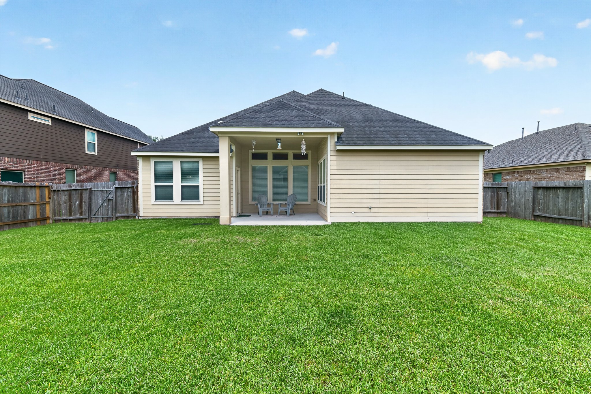 24711 East Burnaby Circle Spring, TX 77373 - Photo 19 of 20 a view of a house with a backyard