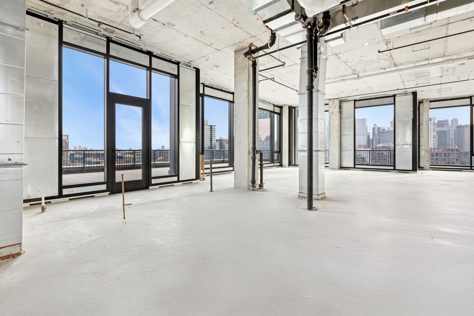 21 North May Street, Unit 1502 Chicago, IL 60607 - Photo 22 of 42 a view of an empty room with glass door and door
