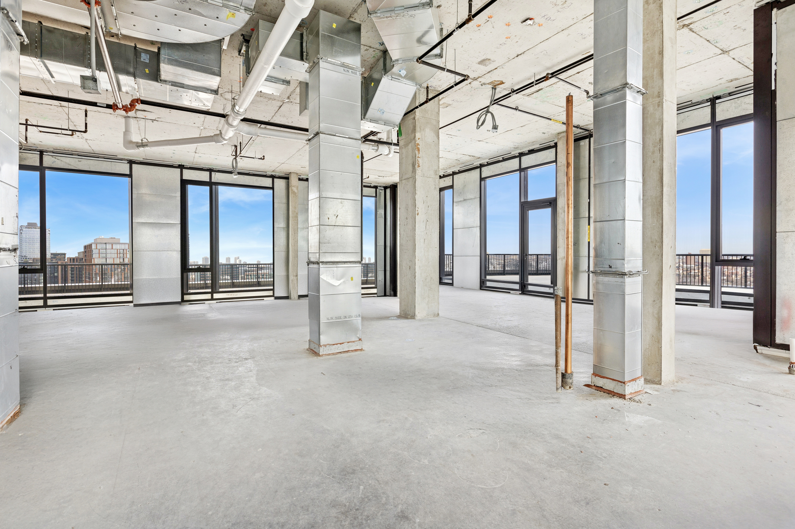 21 North May Street, Unit 1502 Chicago, IL 60607 - Photo 24 of 42 a view of a building with a glass door