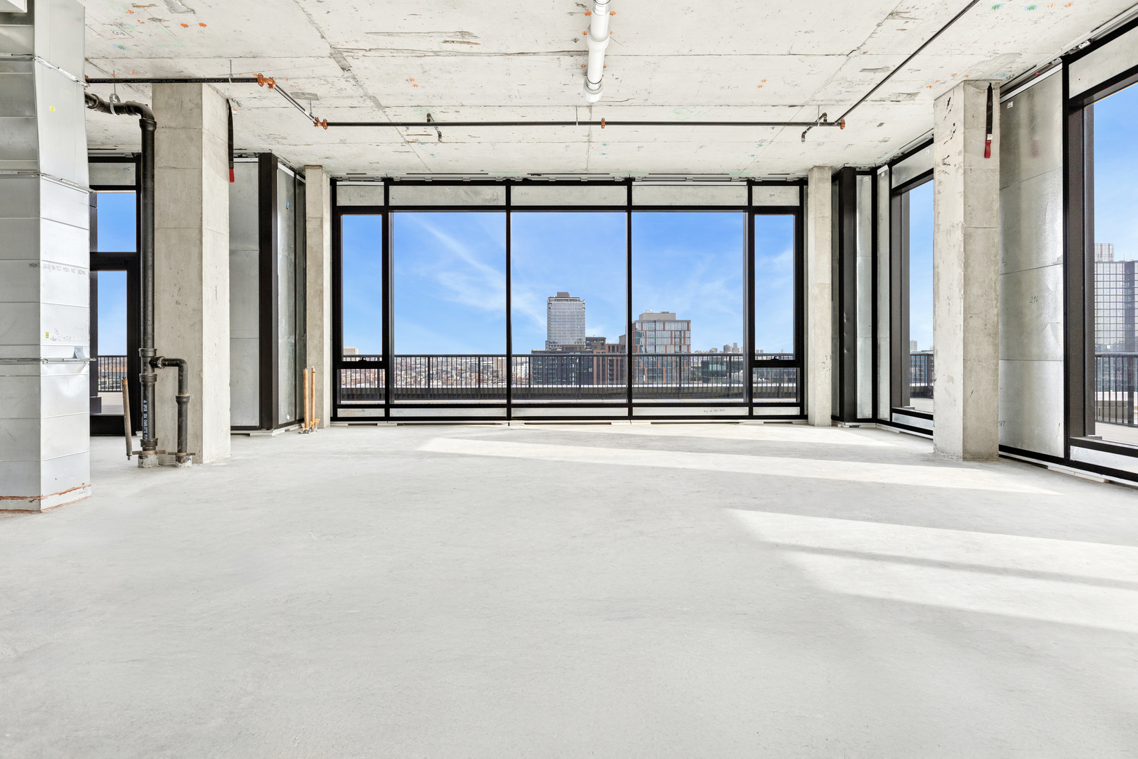 21 North May Street, Unit 1502 Chicago, IL 60607 - Photo 7 of 42 a view of a building with a balcony