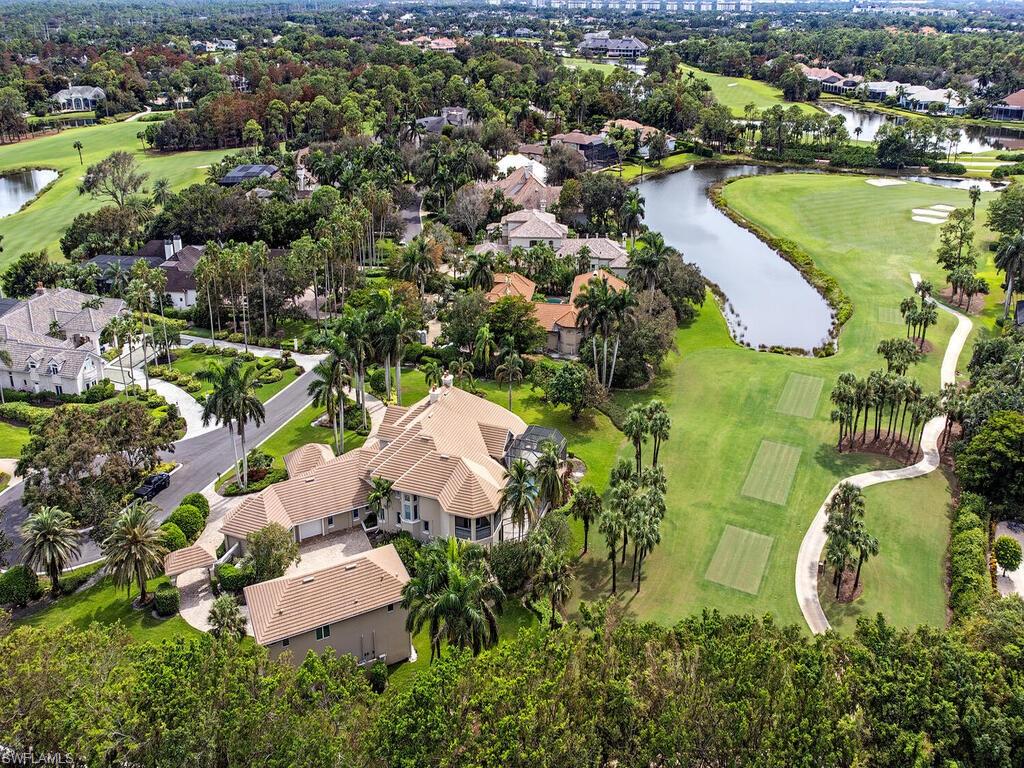 2835 Silverleaf Lane Naples, FL 34105 - Photo 17 of 50 an aerial view of residential house with outdoor space and swimming pool