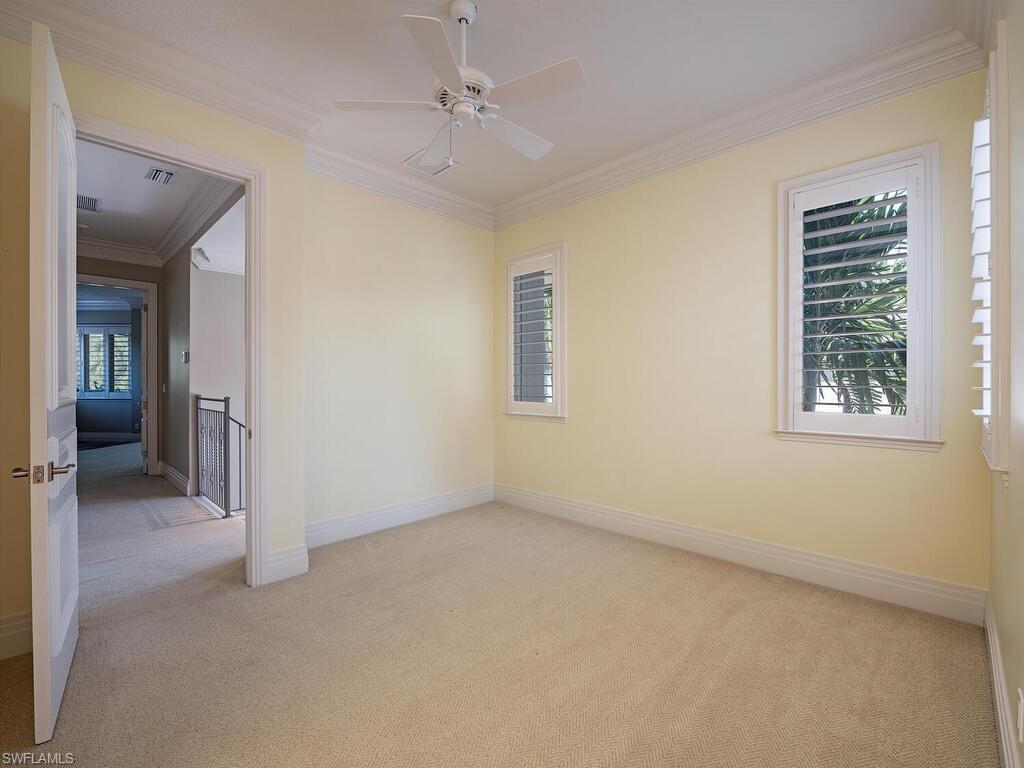 2835 Silverleaf Lane Naples, FL 34105 - Photo 35 of 50 a view of an empty room with a window