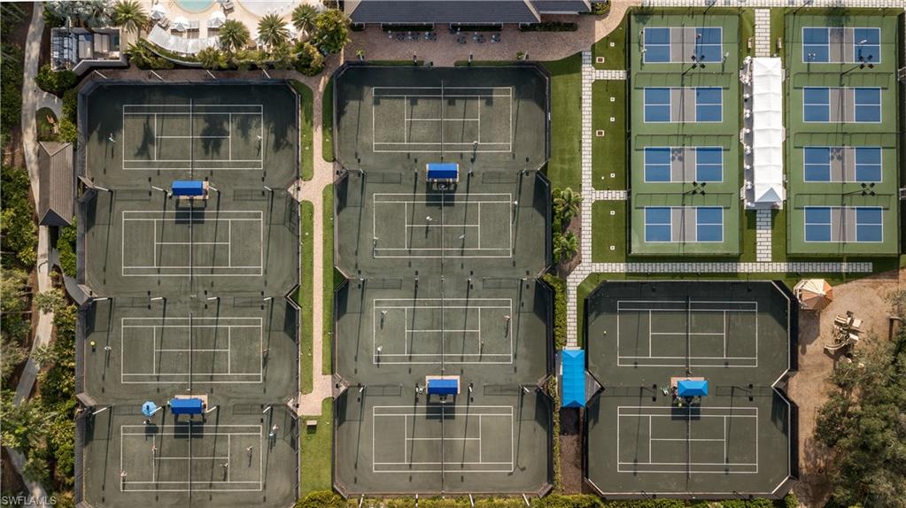 2835 Silverleaf Lane Naples, FL 34105 - Photo 46 of 47 a front view of a house with a yard