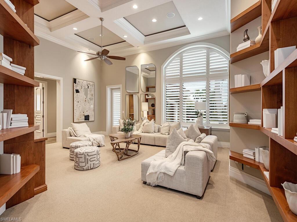 2835 Silverleaf Lane Naples, FL 34105 - Photo 5 of 47 a living room with furniture and a large window