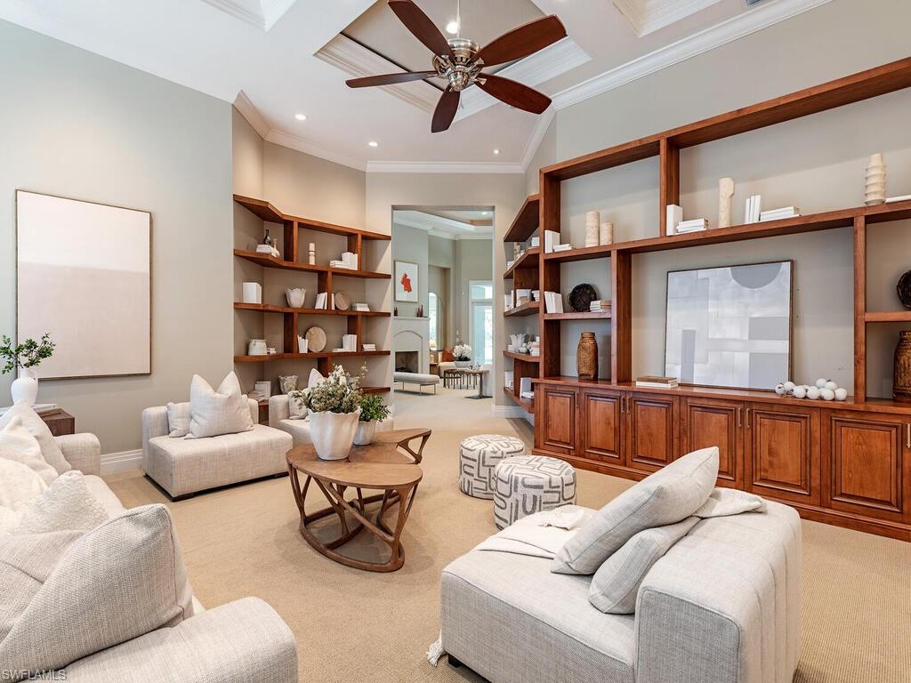 2835 Silverleaf Lane Naples, FL 34105 - Photo 6 of 47 a living room with furniture and a wooden floor