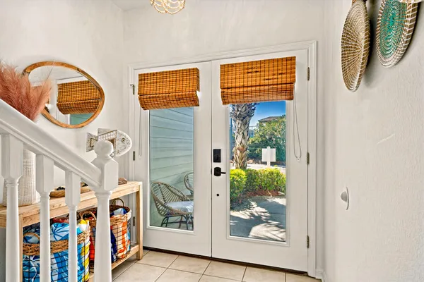 a view of an entryway with wooden floor