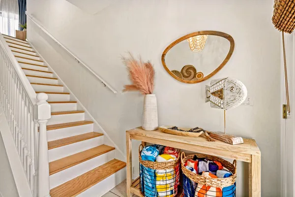 a view of a entryway with wooden floor