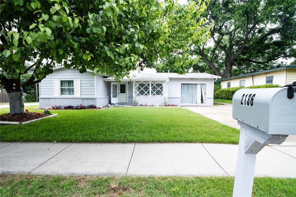 2136 Ridgeway Street Arlington, TX 76010 - Photo 1 of 32 a view of house with a yard