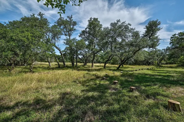 a view of outdoor space with deck and yard