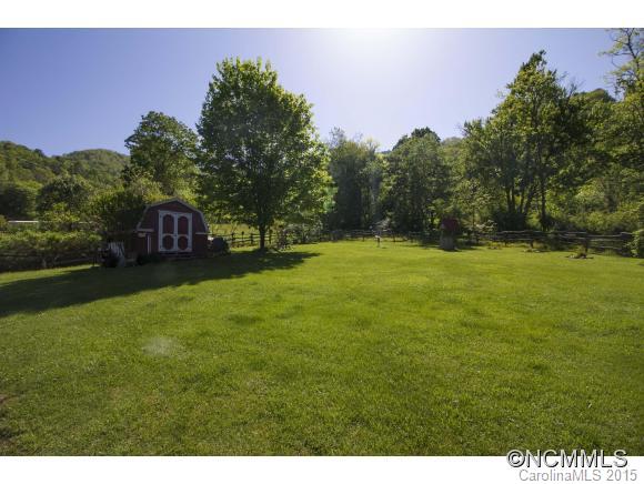 442 Van Arrington Road Clyde, NC 28721 - Photo 21 of 22 a view of a green field