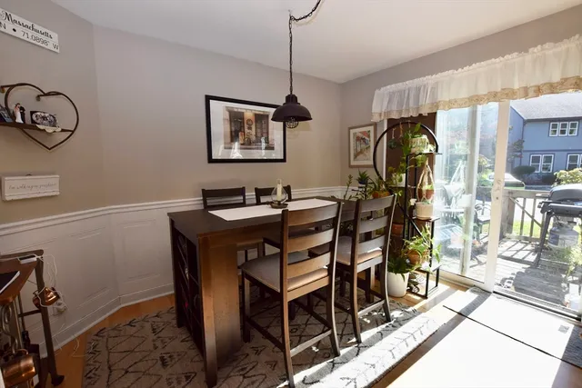 a bedroom with furniture and a flat screen tv