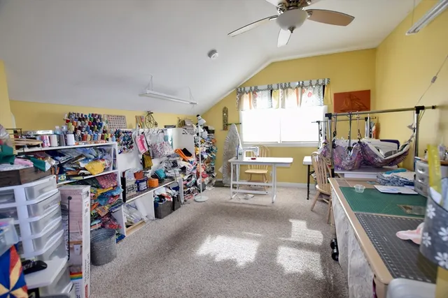 a view of a chairs and table in the balcony