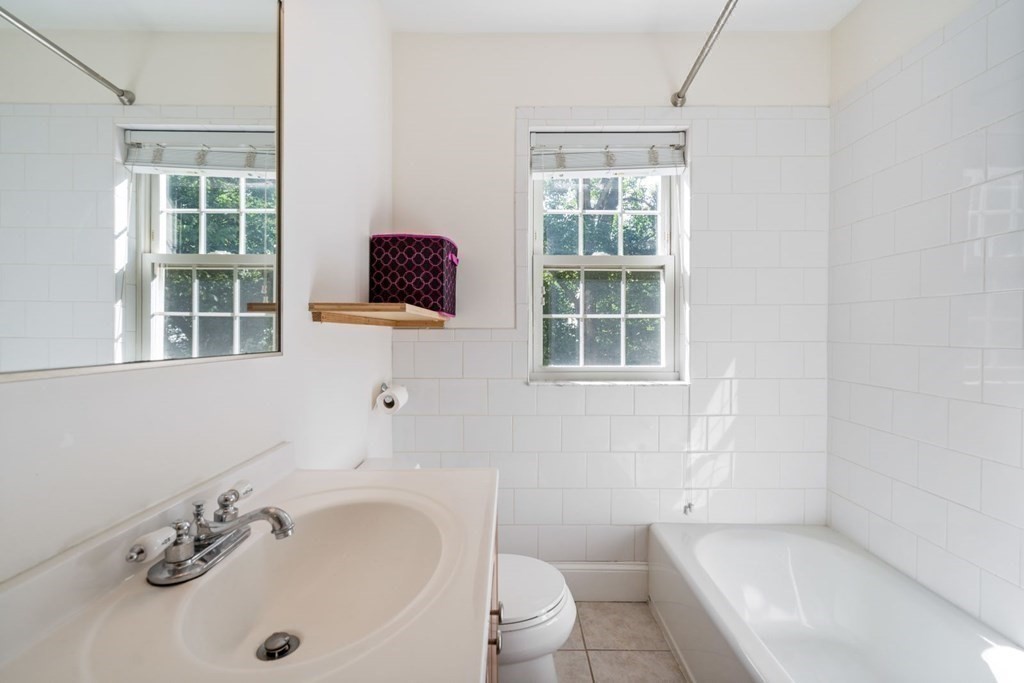 43 Hackensack Road Brookline, MA 02467 - Photo 13 of 24 a bathroom with a sink and a tub