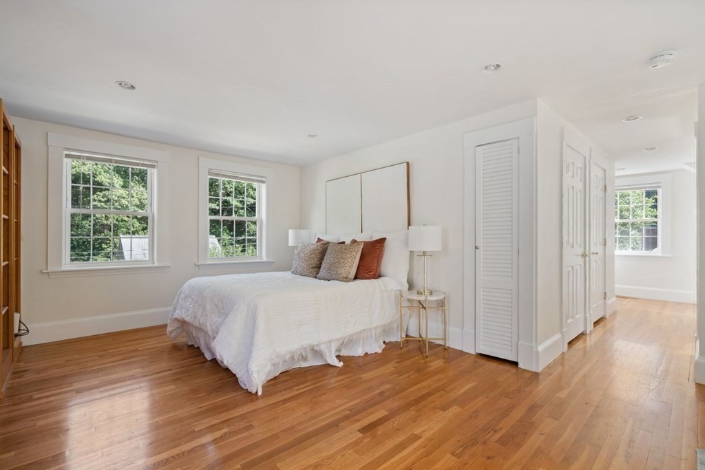 43 Hackensack Road Brookline, MA 02467 - Photo 15 of 24 a spacious bedroom with a bed and wooden floor
