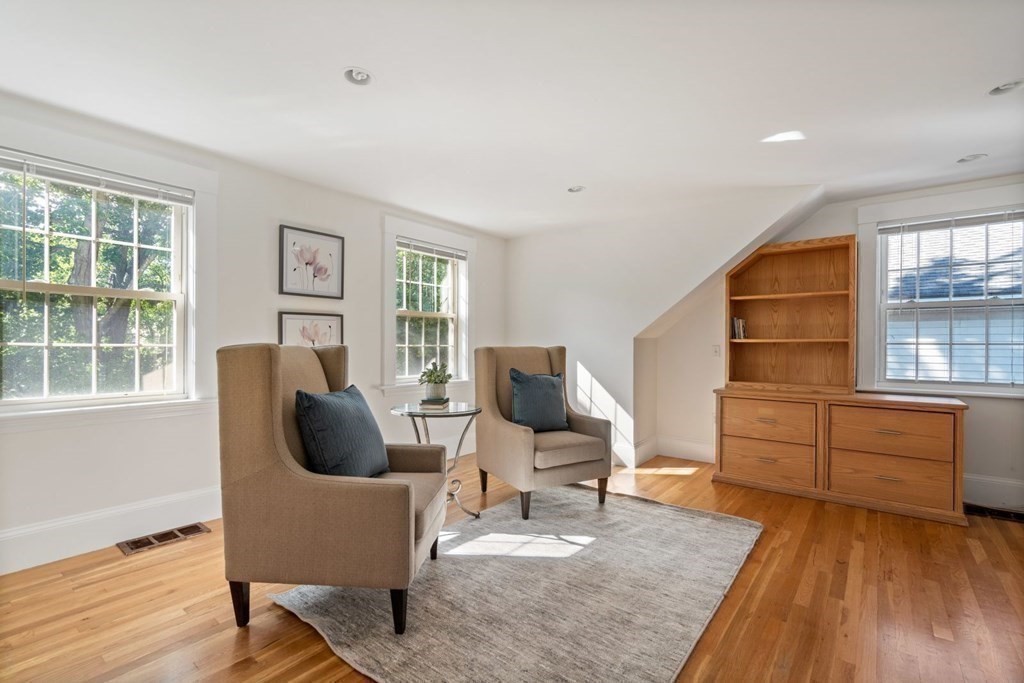 43 Hackensack Road Brookline, MA 02467 - Photo 16 of 24 a living room with furniture and a wooden floor