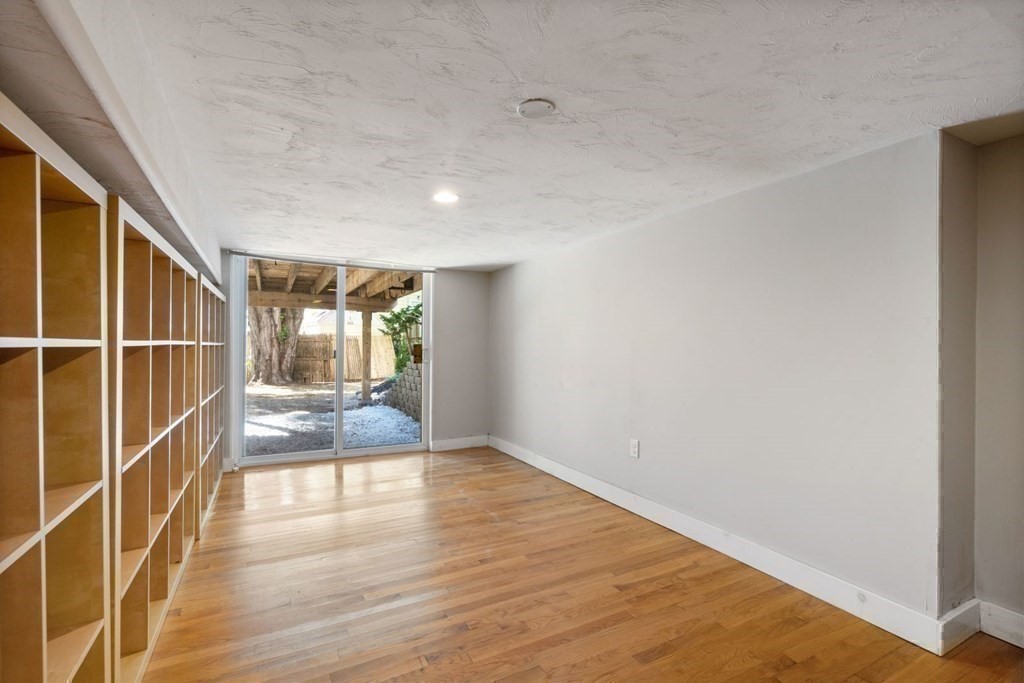 43 Hackensack Road Brookline, MA 02467 - Photo 20 of 24 a view of entryway with wooden floor