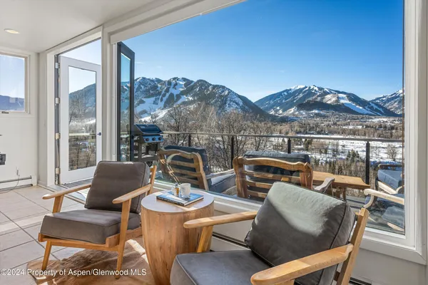 a outdoor living space with furniture and mountain view