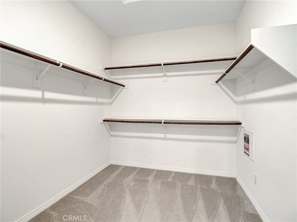43885 Arancia Way Indio, CA 92203 - Photo 13 of 26 a view of an empty walk in closet