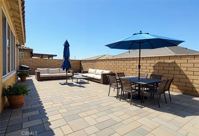 a view of a terrace with sitting area