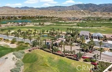 a view of a city with mountains in the background