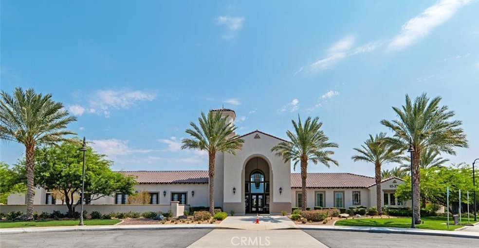 43885 Arancia Way Indio, CA 92203 - Photo 20 of 26 a front view of multiple houses with yard