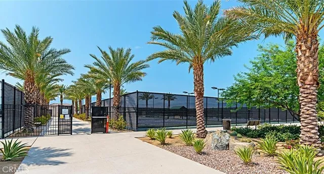 a view of a palm trees in front of a house