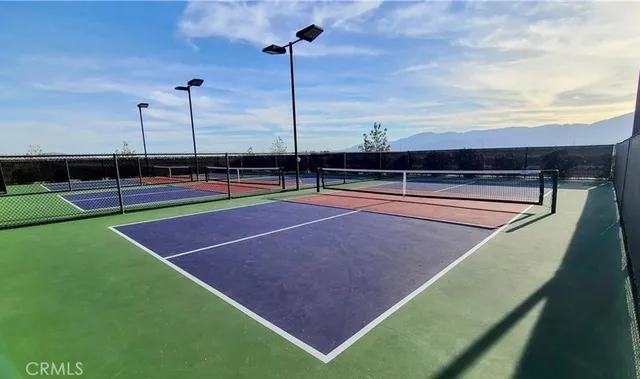 a view of an outdoor space and tennis court